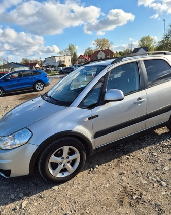 Suzuki SX4 cena 24000 przebieg: 97300, rok produkcji 2009 z Tychy małe 46